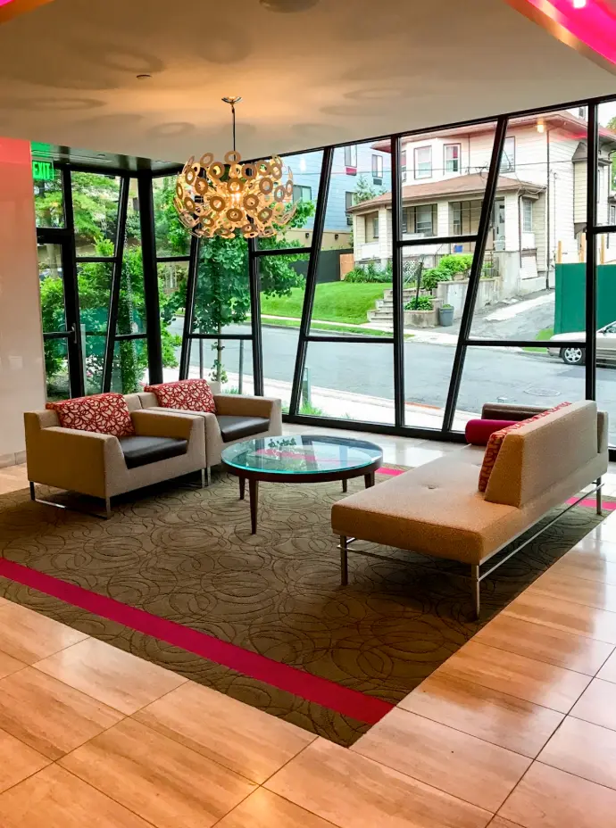 Elegant commercial interior design with carpets and modern furniture – RB Ambiance
